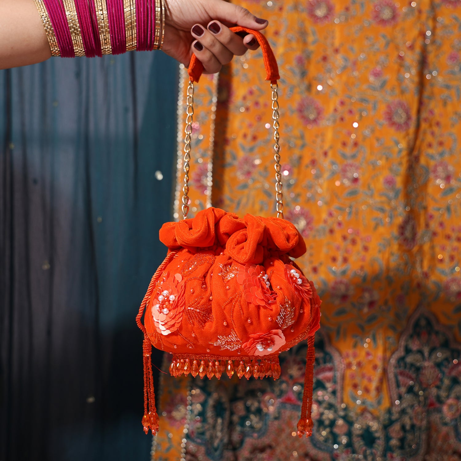 Kumkum Orange potli bag