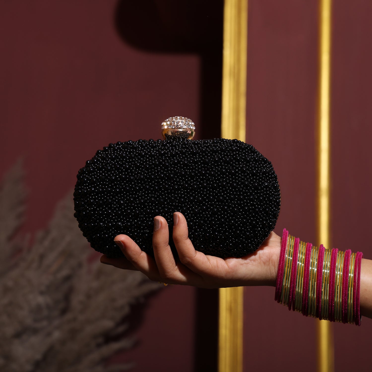 Lulu black oval clutch