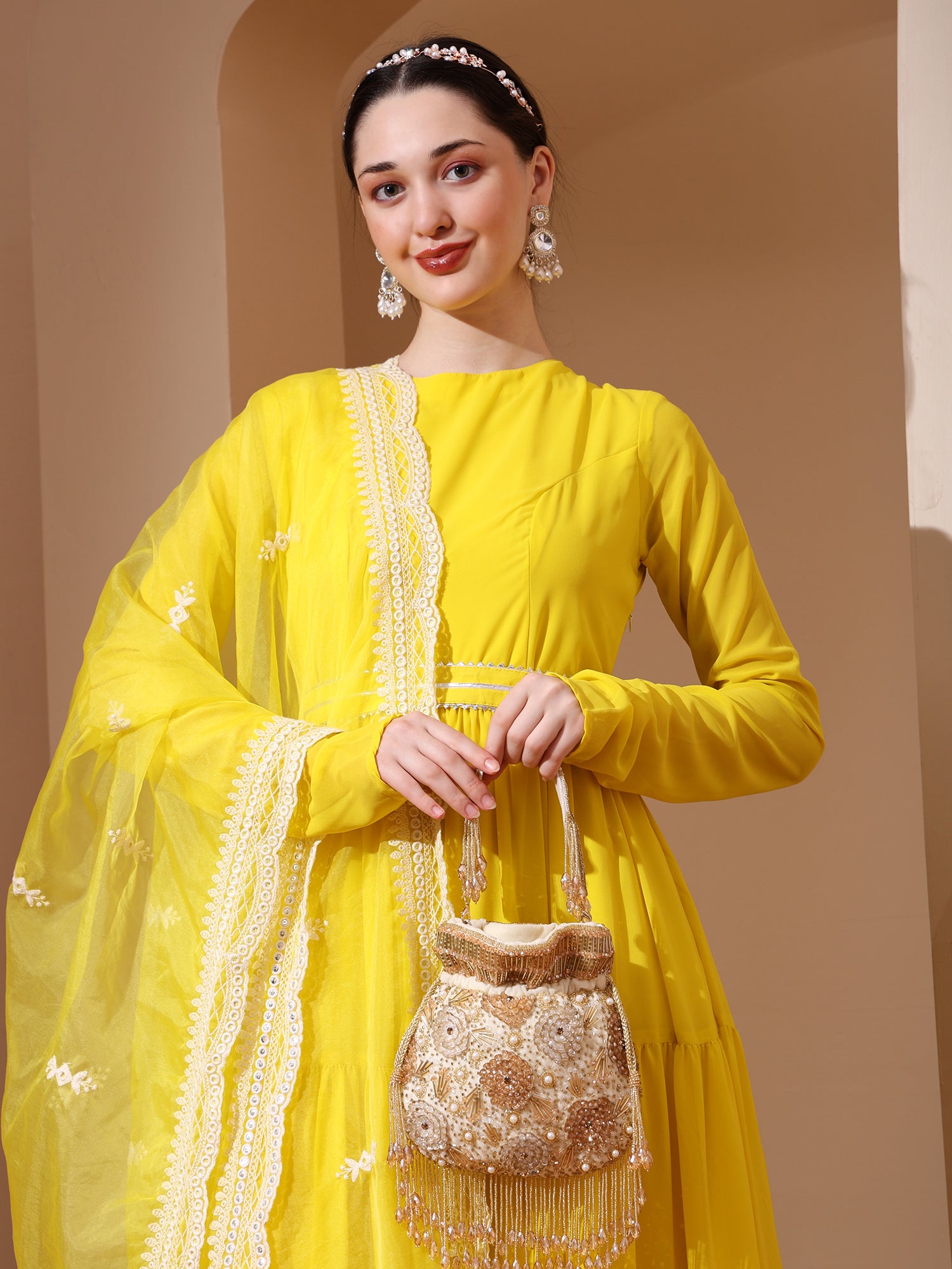 Laalima Golden Velvet Potli