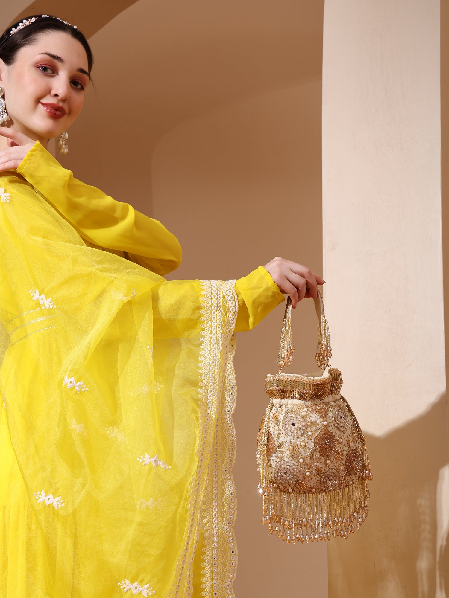 Laalima Golden Velvet Potli