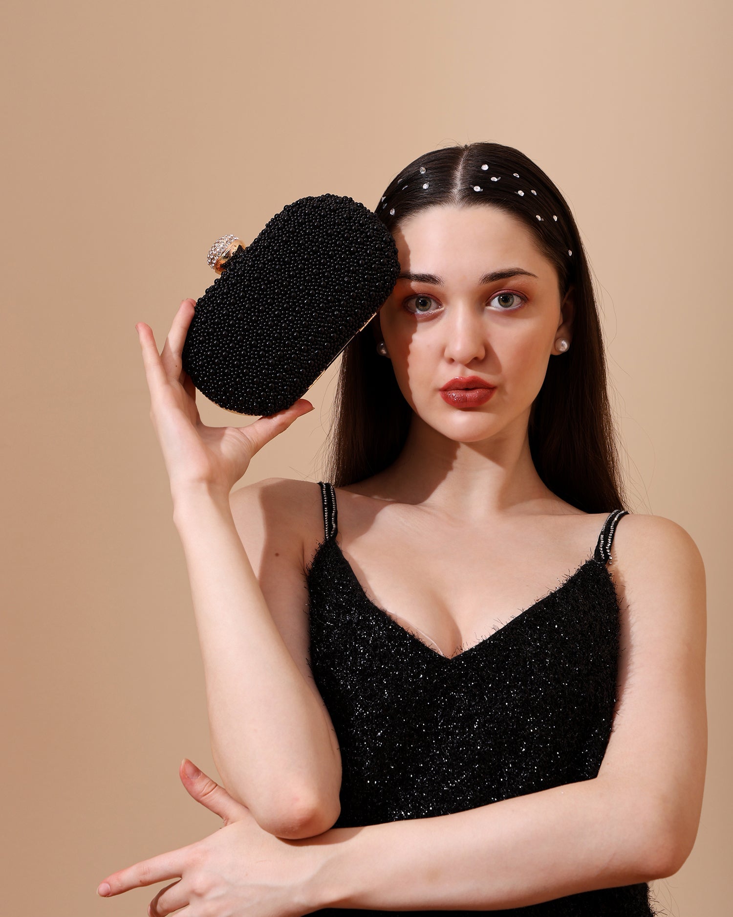 Lulu black oval clutch