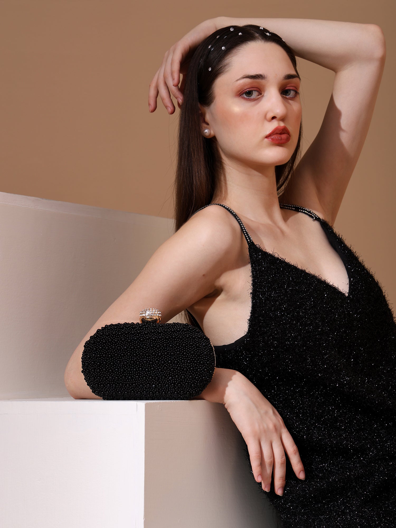 Lulu black oval clutch