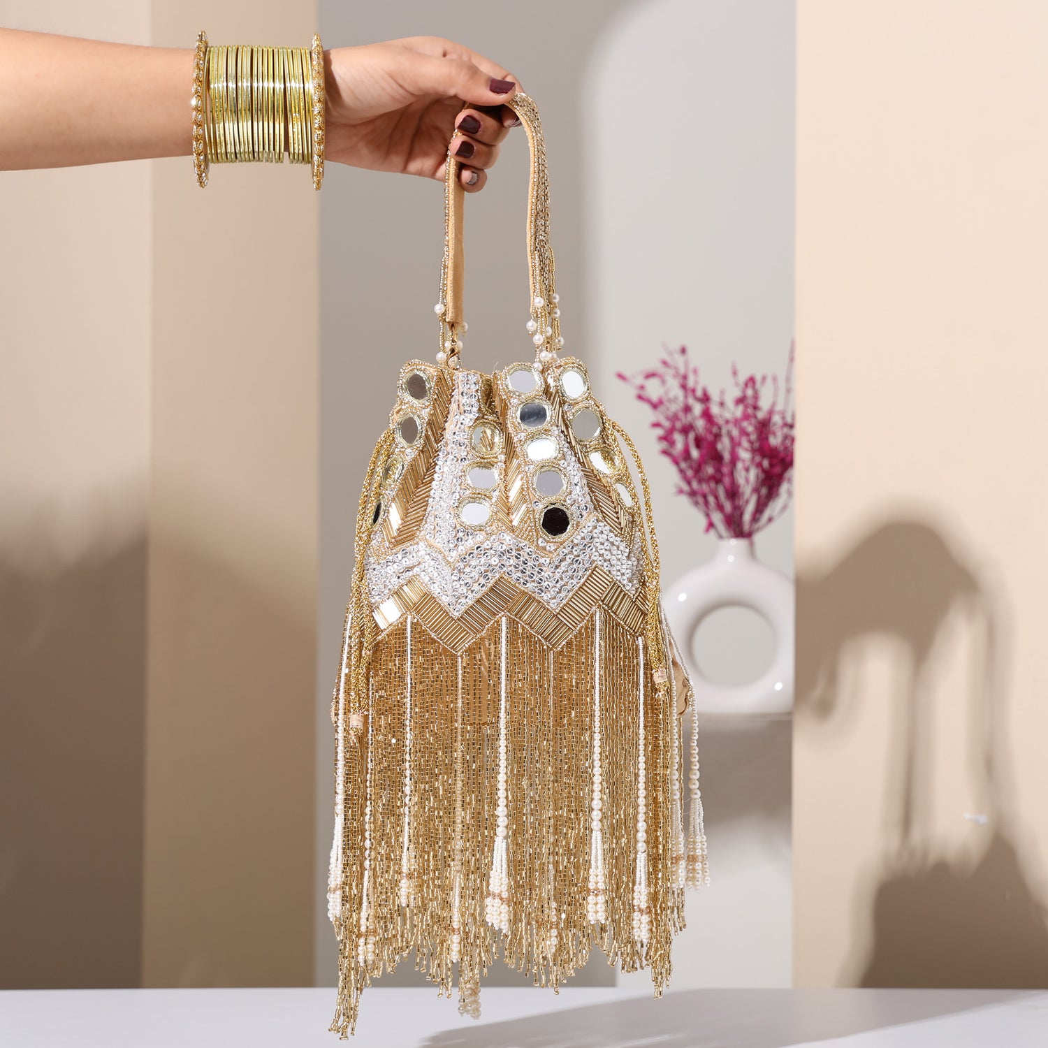 Sitara Golden potli bag