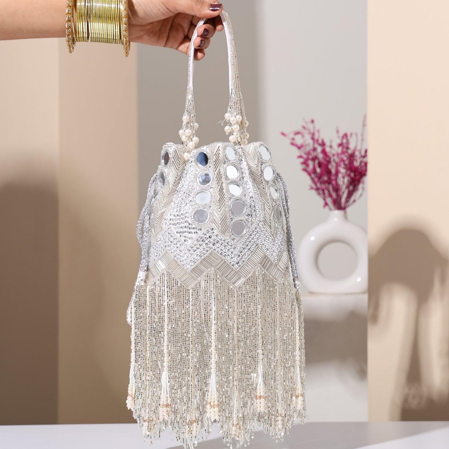 Sitara white potli bag