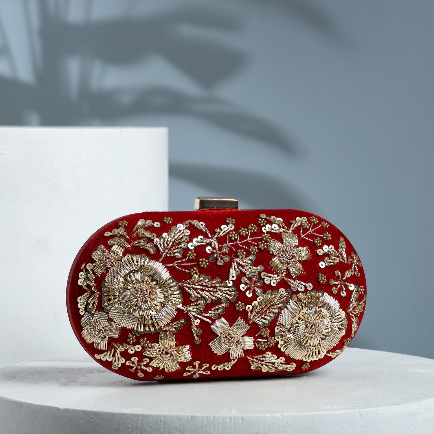 Ishani Mehroon velvet clutch