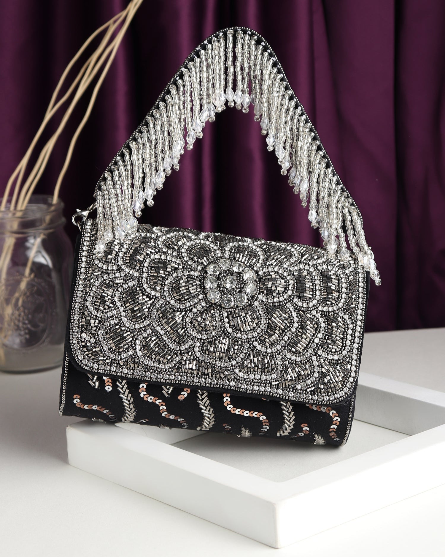 Raaz black flap bag