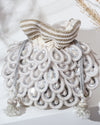 Designer festive potli bag with pearls, White pearl potli bag handcrafted for weddings, Bridal potli with pearl detailing, Handmade royal white potli bag India